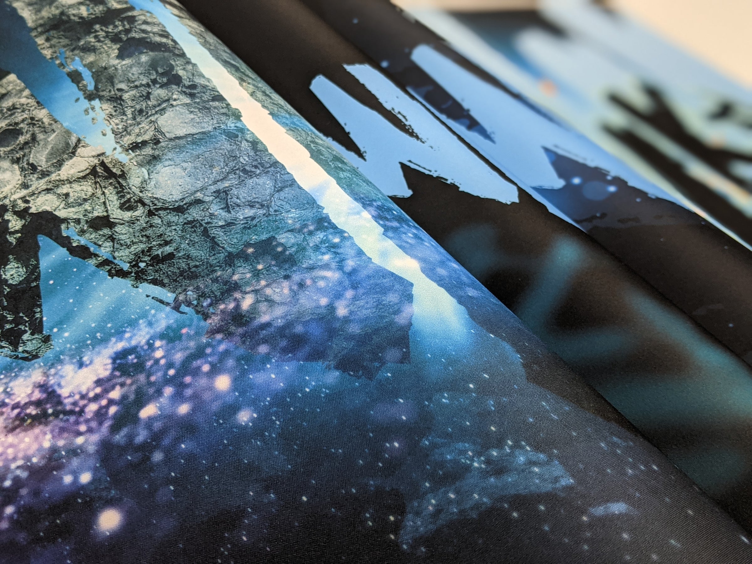 Close up of mousepad and deskmat fabric and beautiful custom print.