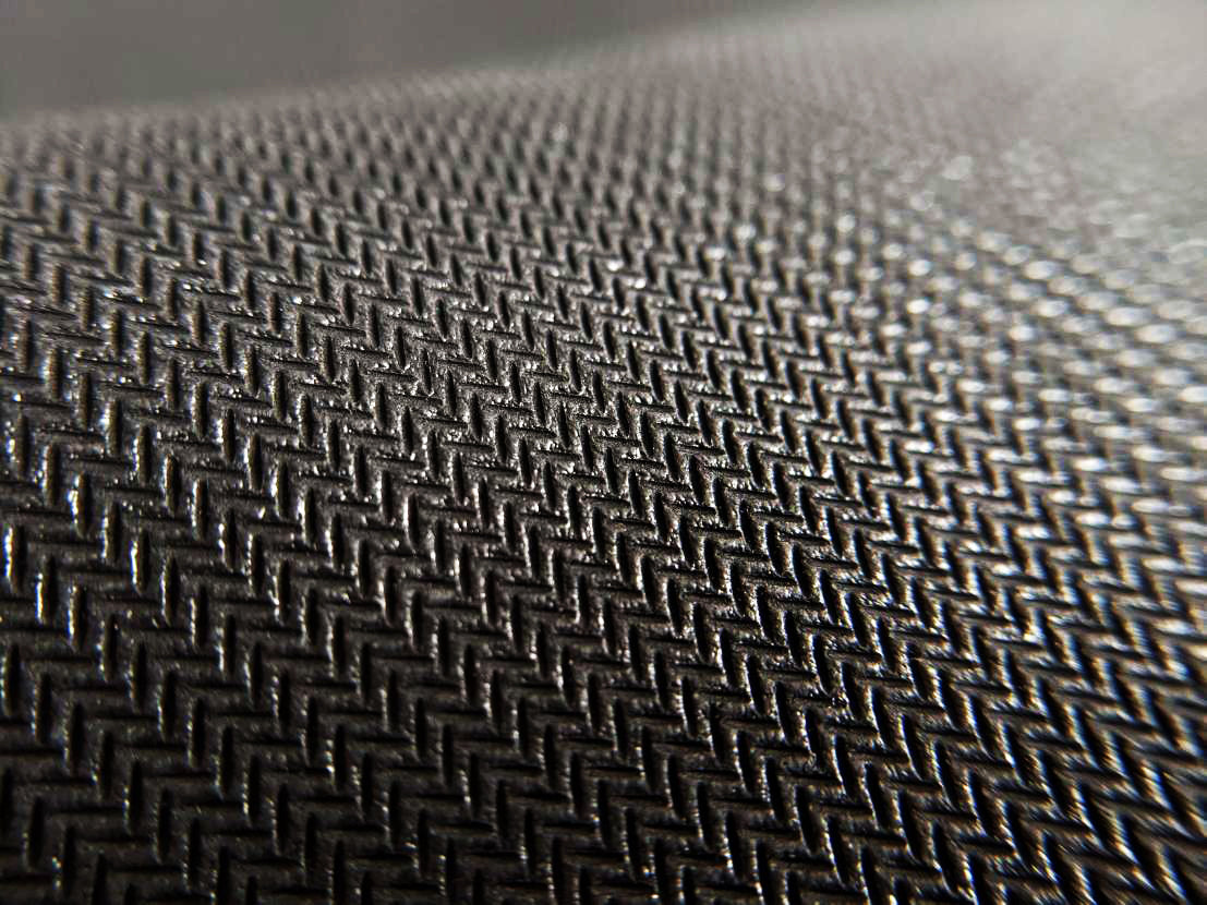 Close up of rubber base on custom mousepads.